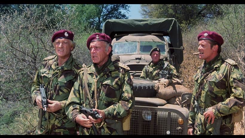 Richard Burton, Roger Moore, Richard Harris, and Jack Watson in The Wild Geese (1978)