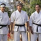 Ralph Macchio, Yuji Okumoto, and William Zabka in Cobra Kai (2018)