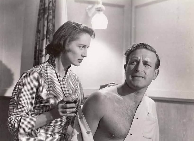 Marissa O'Brien and Lawrence Tierney in Kill or Be Killed (1950)