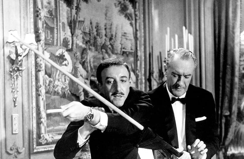 Peter Sellers and George Sanders in A Shot in the Dark (1964)