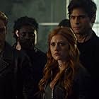 Emeraude Toubia, Katherine McNamara, Dominic Sherwood, and Matthew Daddario in Shadowhunters (2016)