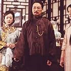 Wei Zhao, Zhenhai Kou, Ke Hu, and Yung-Hsin Chao in Moment in Peking (2005)