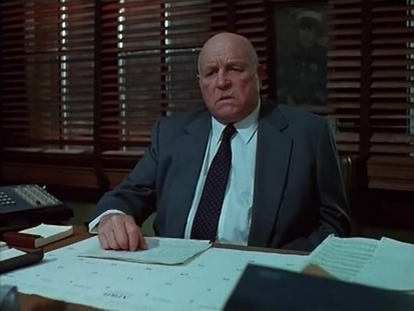 Lawrence Tierney in The Runestone (1991)