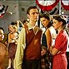 Alexis Bledel, Lauren Graham, and Sean Gunn in Gilmore Girls (2000)