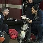 David Eigenberg and Miranda Rae Mayo in Chicago Fire (2012)