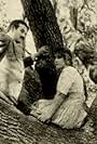 Joseph Graybill and Florence La Badie in The Girl of the Grove (1912)