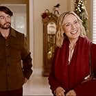 Tyler Harlow and Andrea Lee Davis in "Christmas with the Foxes" (2023)