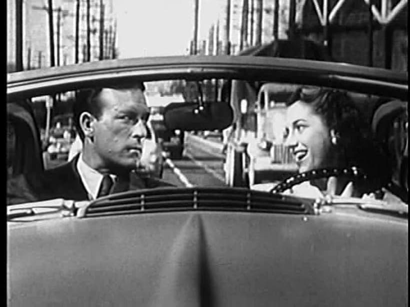 Marjorie Riordan and Lawrence Tierney in The Hoodlum (1951)