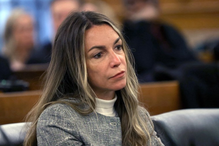 Karen Read seated at her pre-trial hearing at Norfolk Superior Court, in Dedham, Mass.