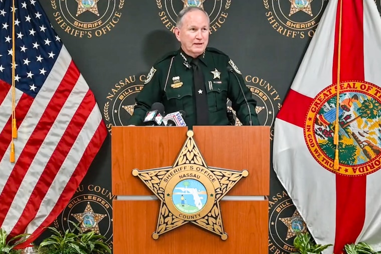 Bill Leeper speaks behind a podium