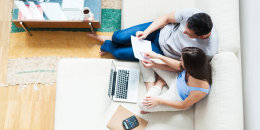 Image: Young couple working on their family finances.