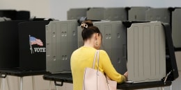 A voter casts their ballot 