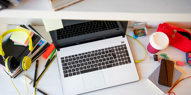 Messy desk with computer