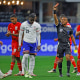 A referee shows a red card to Tim Weah of the U.S. 