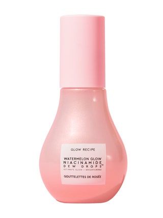 Glow Recipe Watermelon Glow Niacinamide Dew Drops teardrop shaped pink bottle on white background