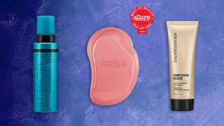 St. Tropez Tangle Teezer and BareMinerals products on a blue background