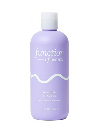 Function of Beauty Wavy Hair Shampoo on white background