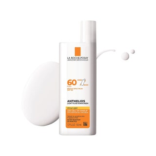 La RochePosay Anthelios Ultra Light Fluid Sunscreen SPF 60 white rectangle bottle of sunscreen with cap to the side and...