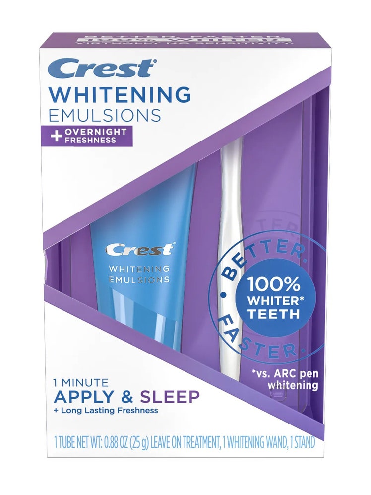 Crest Whitening Emulsions + Overnight Freshness purple box of toothpaste and toothbrush on white background