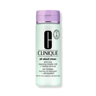 Clinique All About Clean AllInOne Cleansing Micellar Milk  Makeup Remover mint green bottle with purple cap on white...