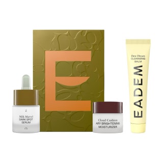 Eadem BareSkin Confidence Brightening Trio green box with skincare products around it on white background