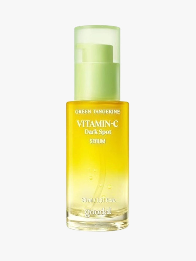 Goodal Green Tangerine Vita C Dark Spot Serum yellow bottle with green top on light grey bottle