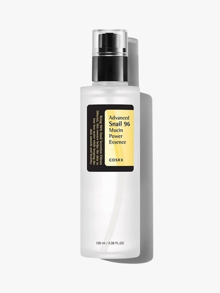 Cosrx Advanced Snail 96 Mucin Power Essence white bottle with black cap on light grey background