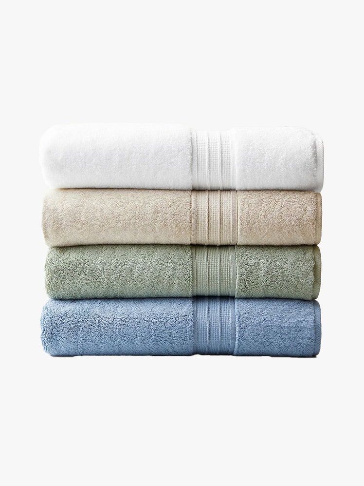 Pottery Barn Hydrocotton Organic Quick-Dry Bath Sheet four folded neutral tone towels on light gray background