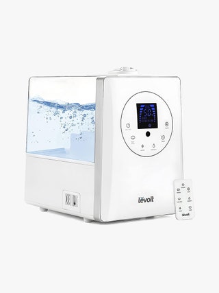 Levoit LV600HH Humidifier white humidifier and remote on light gray background