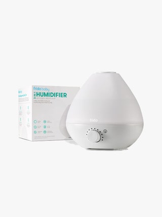 Fridababy 3in1 Humidifier white teardrop shaped humidifier and box on light gray background