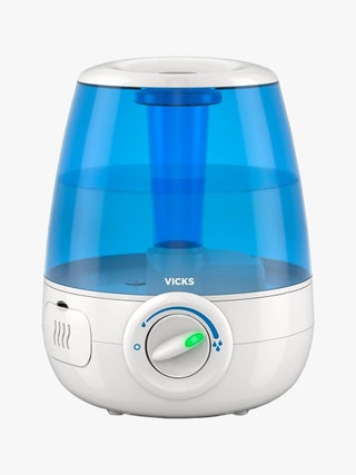 Vicks Cool Mist Humidifier white and blue humidifier on light gray background
