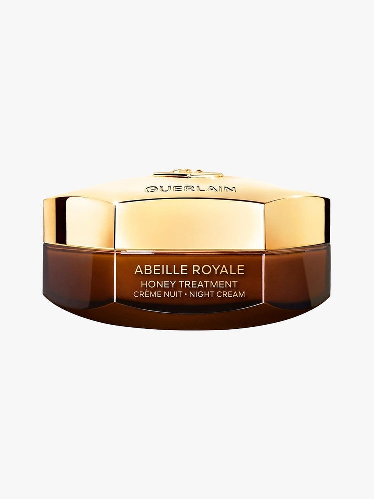 Guerlain Abeille Royale Honey Treatment Night Cream brown flat octagon jar with gold lid on light gray background