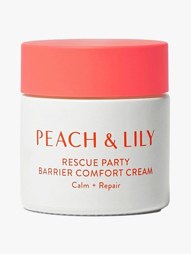 Peach & Lily Rescue Party Barrier Comfort Cream white jar with peach lid on light gray background