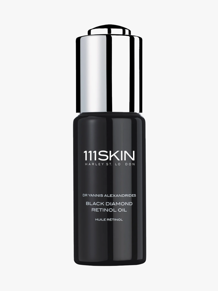 111Skin Black Diamond Retinol Oil in black colored bottle and silver pump