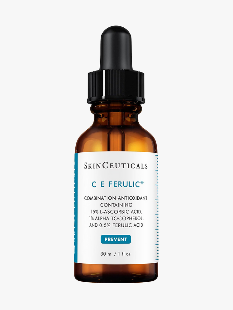 SkinCeuticals C E Ferulic in clear amber bottle with black pipette on light gray background