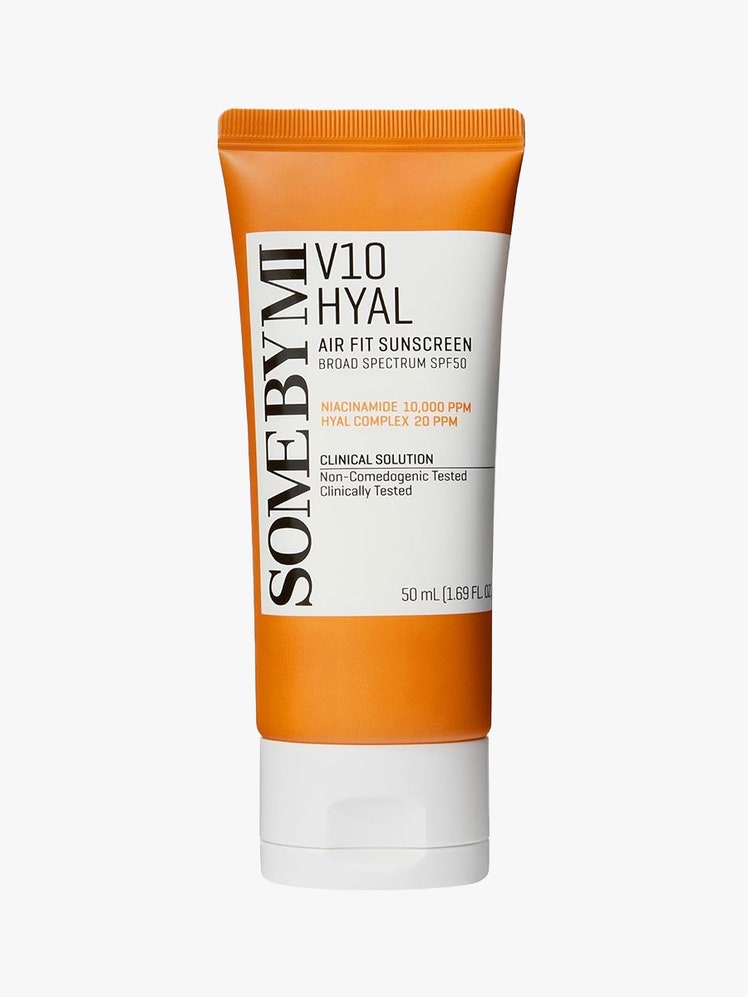 Some by Mi V10 Hyal Airfit Sunscreen Broad Spectrum SPF 50 orange and white squeeze tube with white cap on light grey background