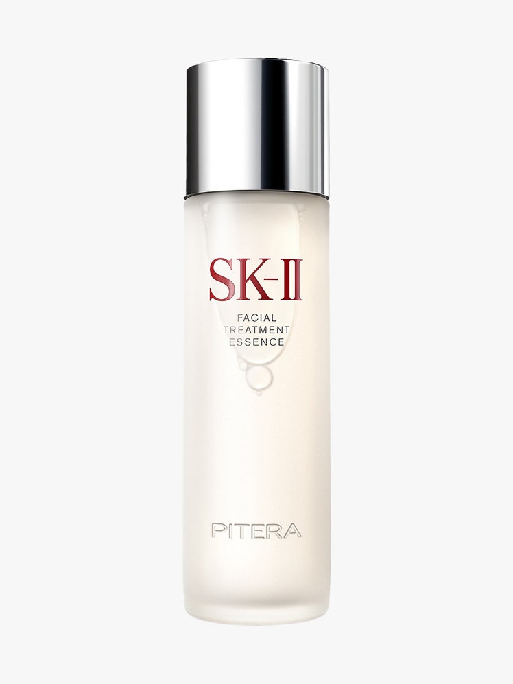 SK-II Facial Treatment Essence off white bottle with silver cap on light gray background