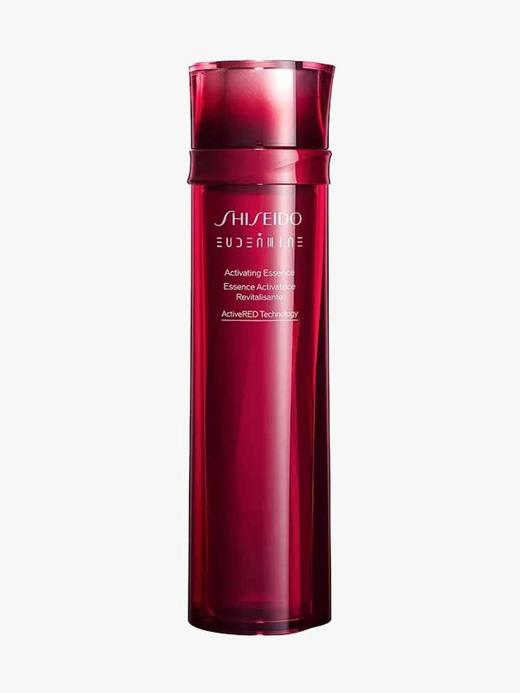 Shiseido Eudermine Activating Essence red bottle of essence on light gray background