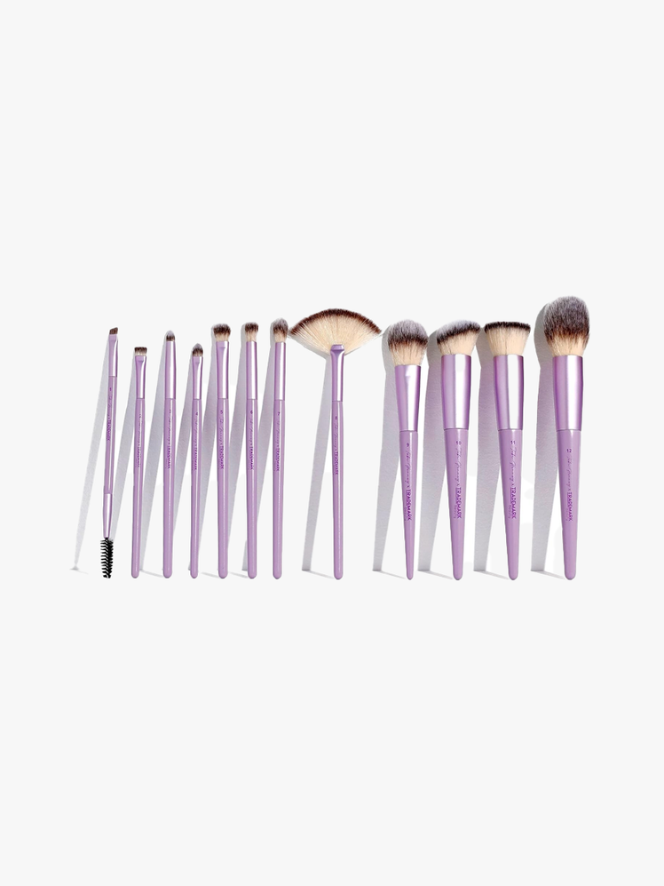 Trademark Beauty The Essentials Makeup Brush Collection with twelve different brushes with soft purple handles on light gray background