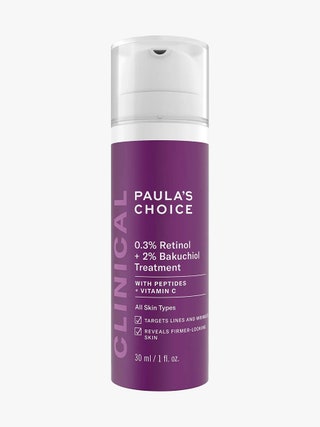 Paula's Choice Clinical 0.3 Retinol  2 Bakuchiol Treatment purple bottle with white pump top on light gray background