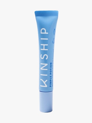Kinship Pimple Potion Retinal  Salicylic Acid Acne Treatment light blue tube on light gray background