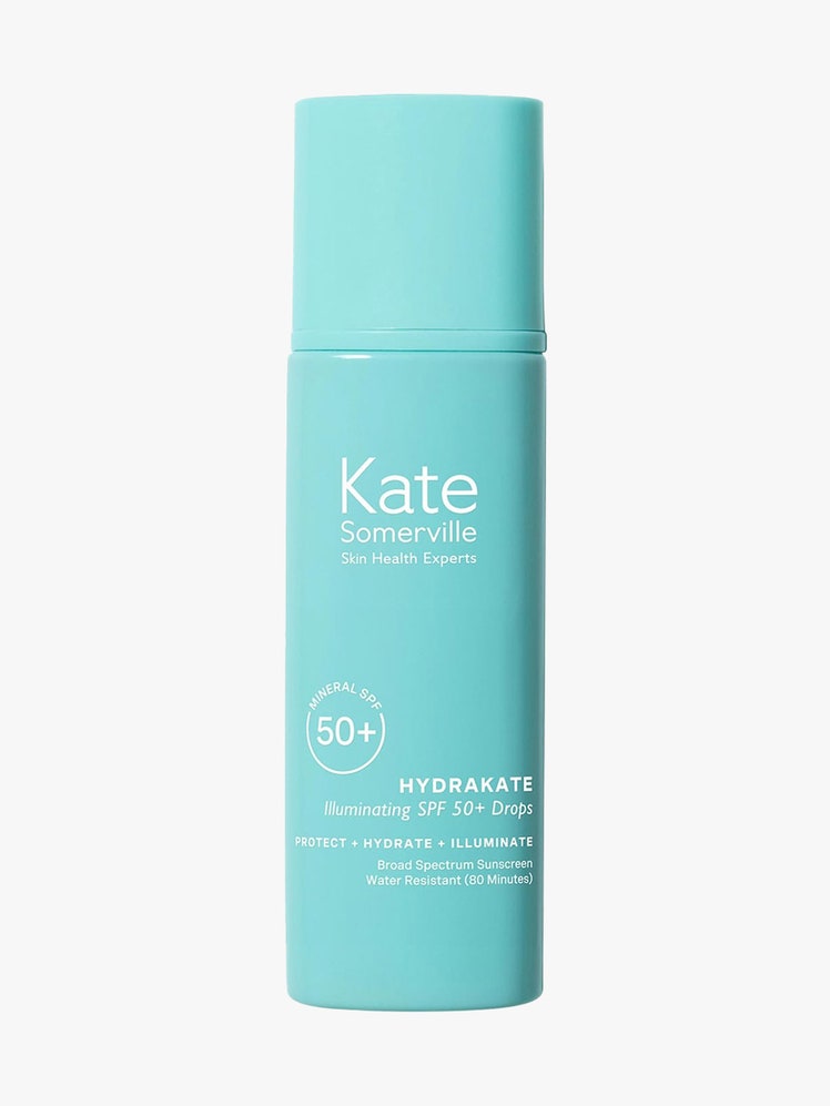 Kate Somerville Hydrakate Illuminating SPF 50+ Drops with Ectoin in blue bottle on light grey background