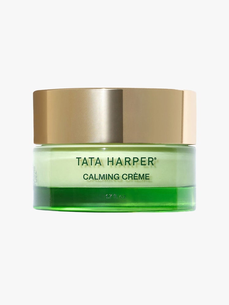 Tata Harper Calming Crème green jar with gold cap on light grey background