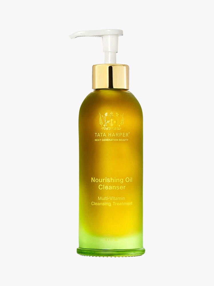 Tata Harper Nourishing Oil Cleanser yellow bottle on light grey background