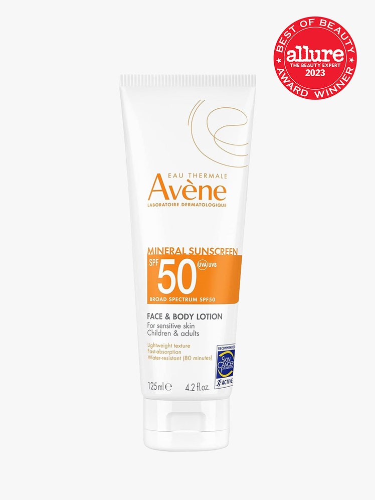 Eau Thermale Avène Mineral Sunscreen Broad Spectrum SPF 50 bottle with orange label next to red BoB seal on light grey background