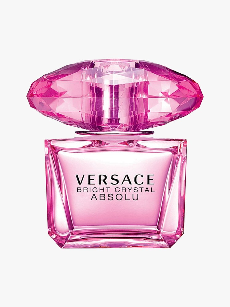 Versace Bright Crystal Absolu Eau de Parfum Spray hot pink crystal perfume bottle with wide bauble cap on light gray background