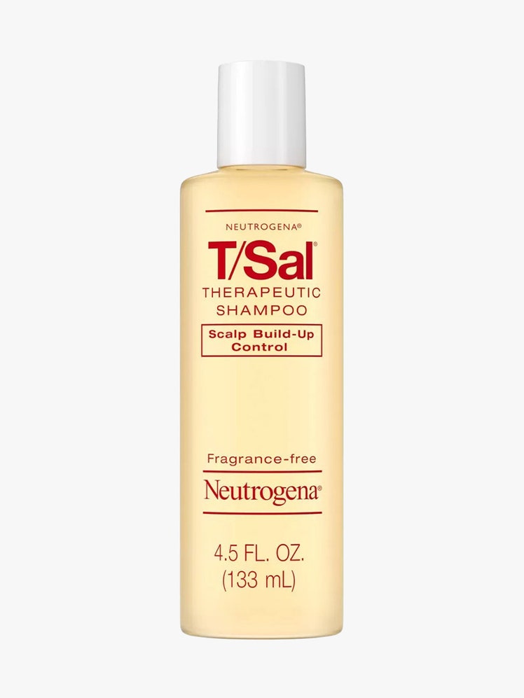 Neutrogena T/Sal Therapeutic Shampoo bottle of pale yellow dandruff shampoo with white cap on light gray background