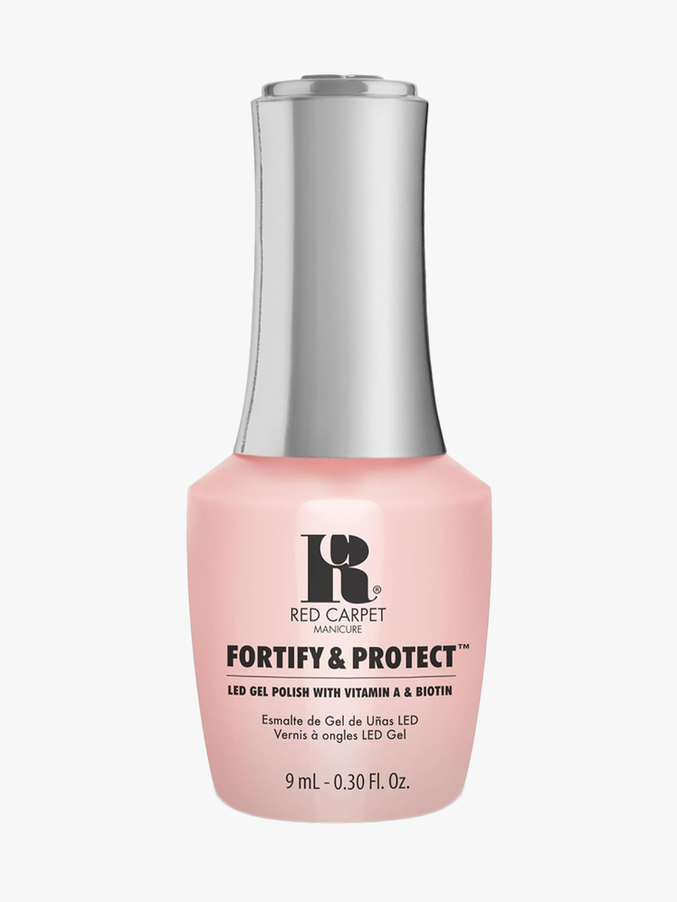 Red Carpet Manicure Gel Nail Polish in branded pink bottle with silver cap on light gray background
