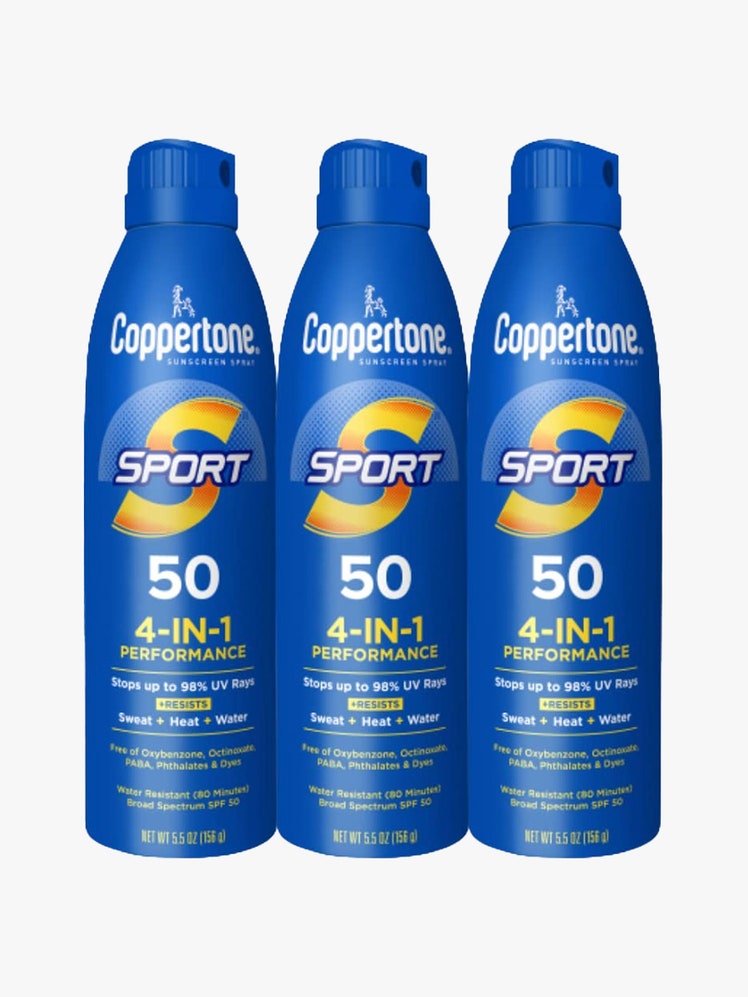 Coppertone Sport Sunscreen Spray SPF 50 (3-Pack) three blue spray bottles of sunscreen on light gray background