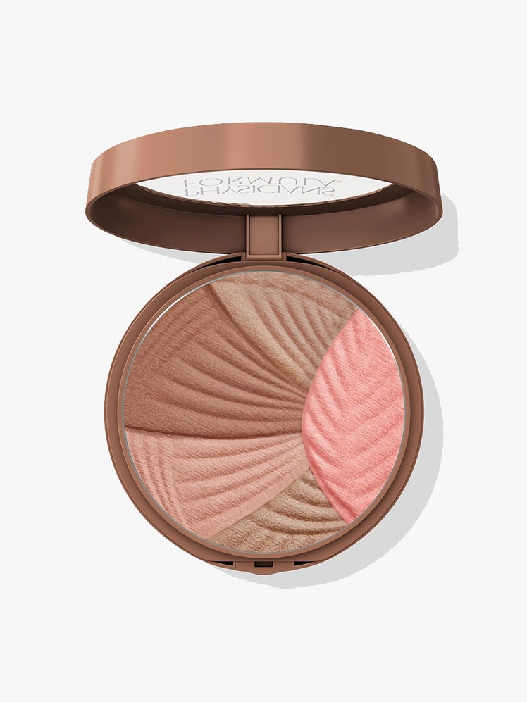 A compact of the Physicians Formula Butter Glow Bronzer + Blush on a light gray background